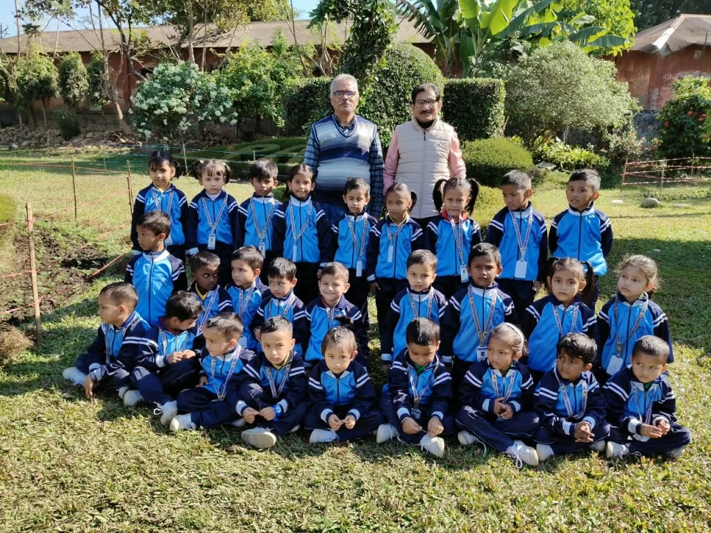 MGM School students and teachers gathered together in the school garden